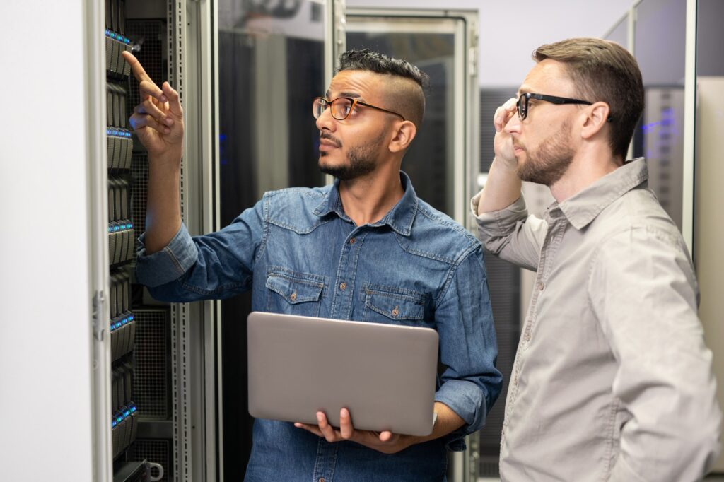 Network engineers working with supercomputer